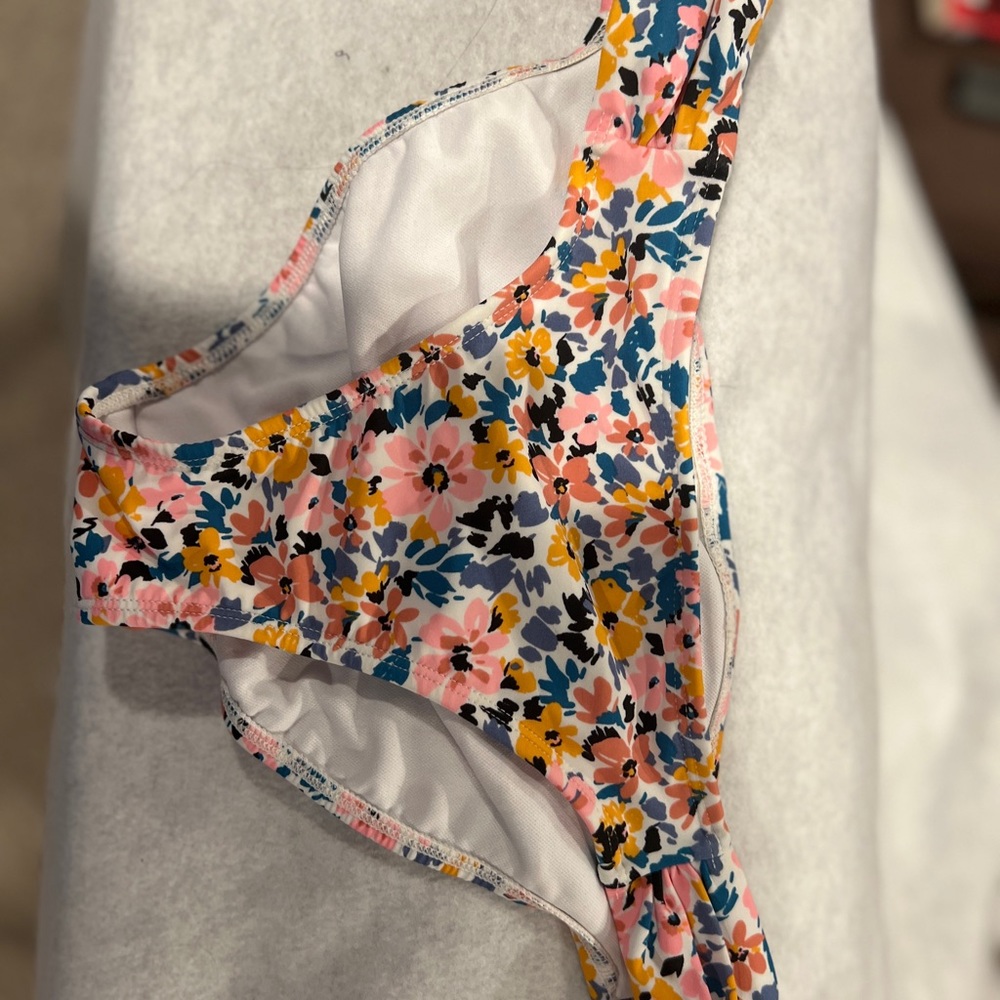Bikini bottoms size m teens with a scrunched back.